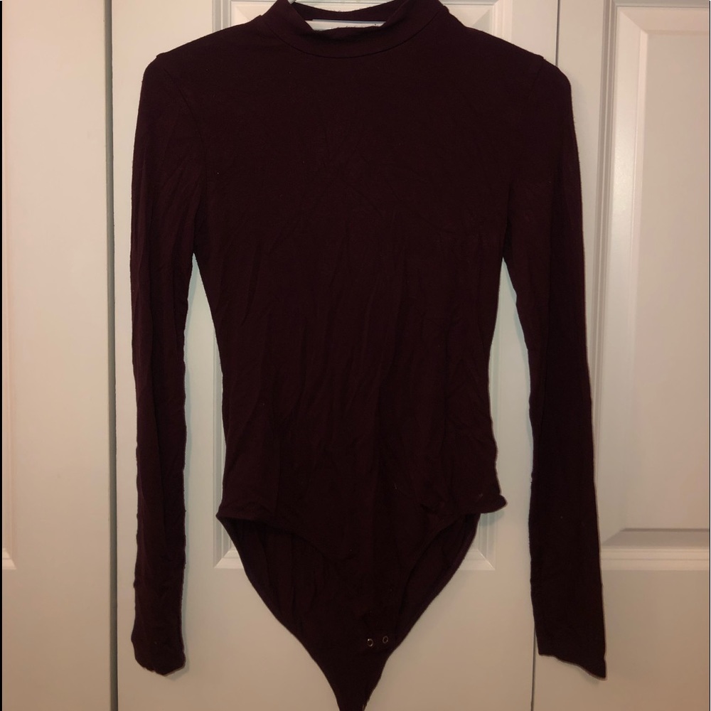 Long sleeve, high necked, body suit